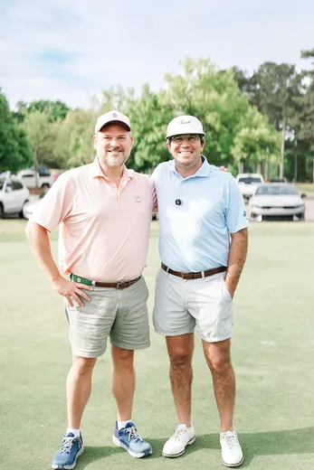 Two members on the practice green