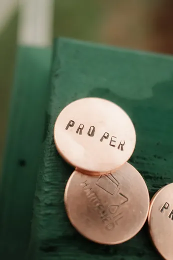 Stamped PROPER ball markers