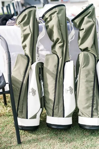 Carry bags lined up on the grass