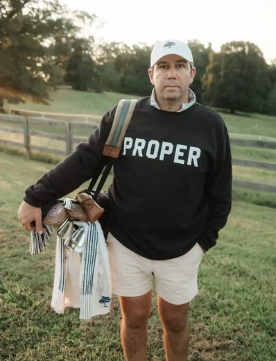 The PROPER crewneck, clubs in hand
