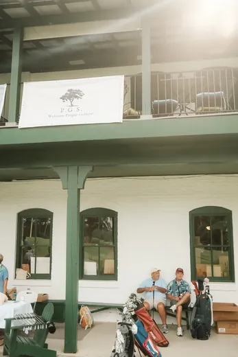 The clubhouse porch, P.G.S. banner hung
