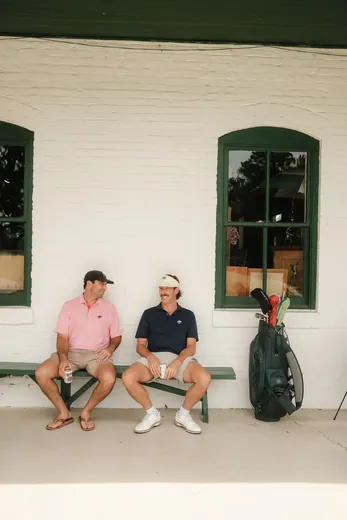 Two members on the porch bench